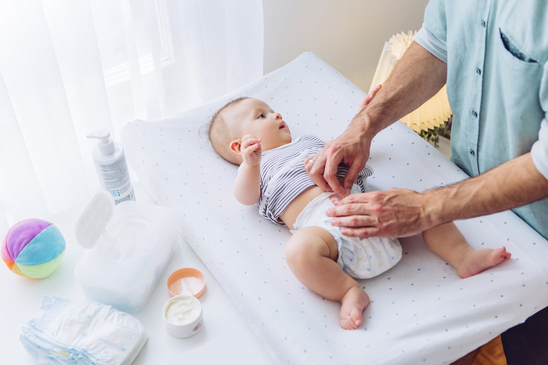 Changing baby diaper